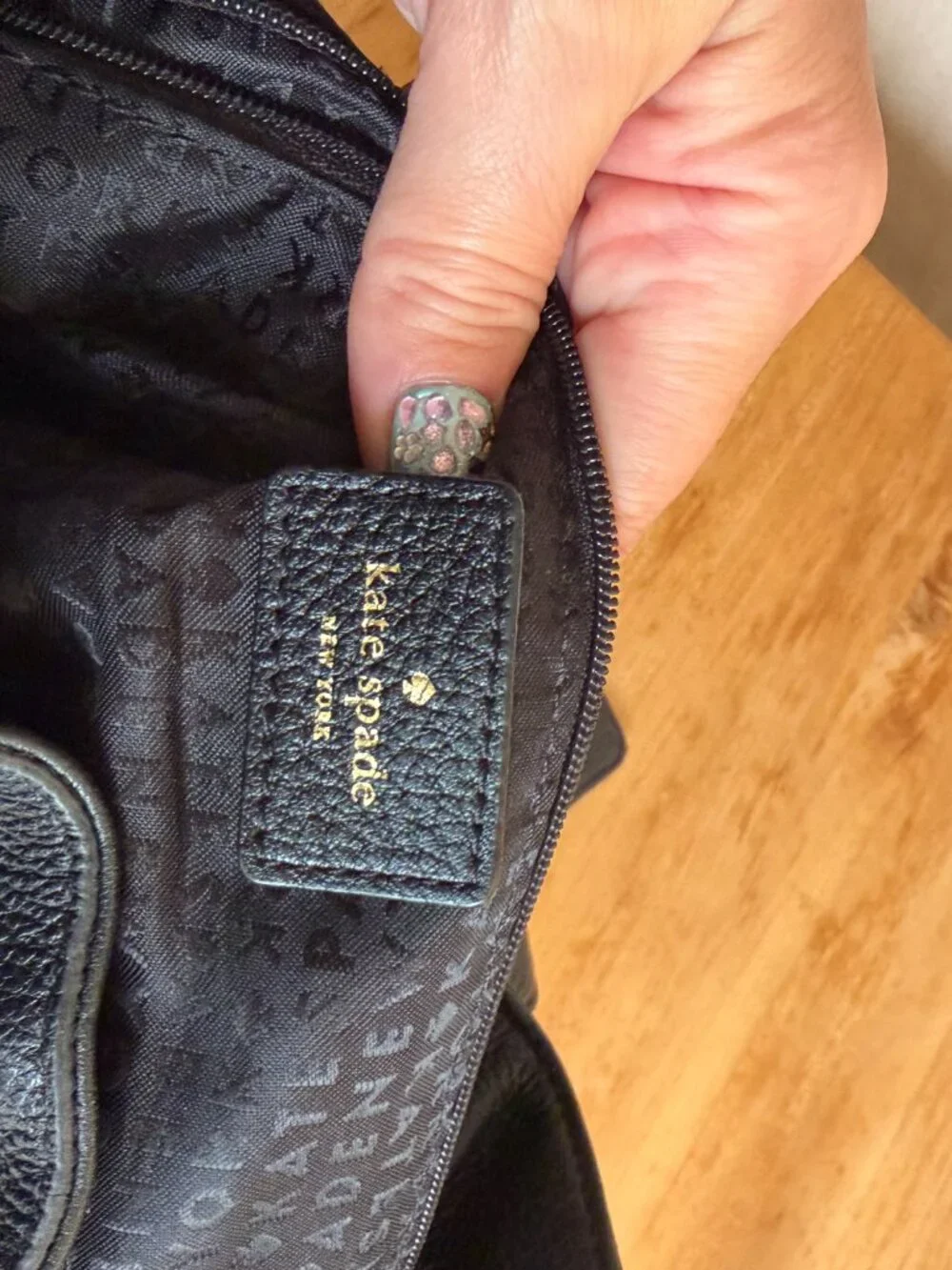 Kate Spade Pebbled Leather Backpack with tassles